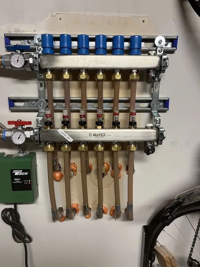 Plumber performing Water Heater Repair at a residential property in Crestwood